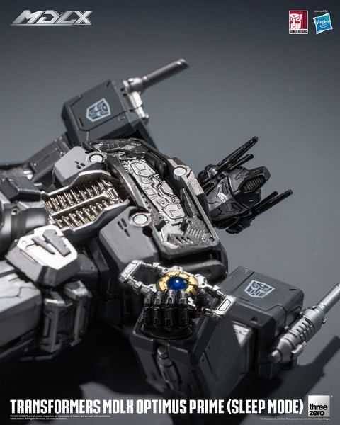 Колекційна фігурка ThreeZero Transformers MDLX Action Figure Optimus Prime (Sleep Mode) 18 cm AF5681 фото